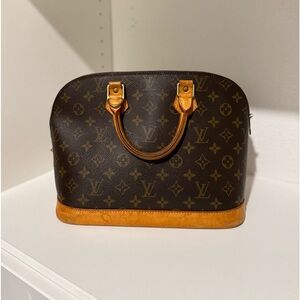Louis Vuitton Alma PM Monogram (water mark on bottom)